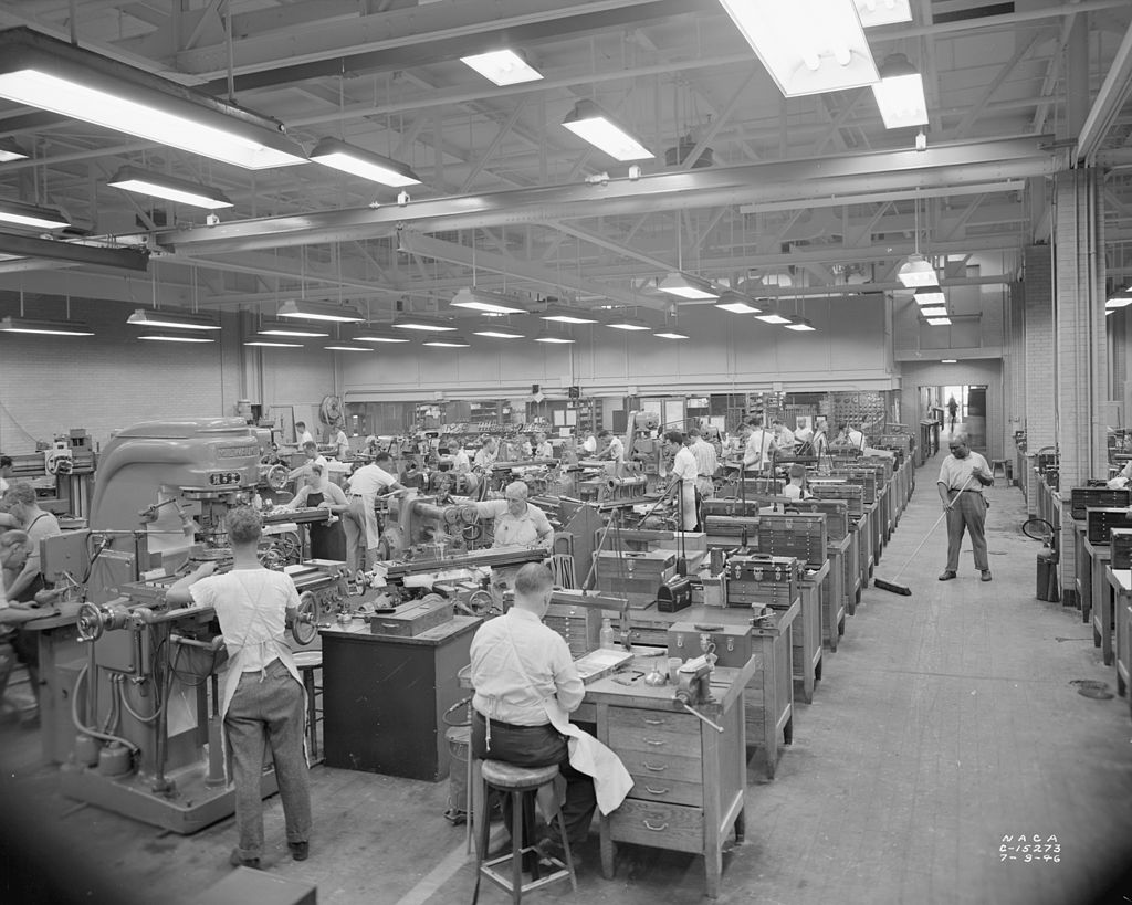 Machinists and toolmakers use precision machinery to make experimental engine parts, Cleveland, Ohio 1946.